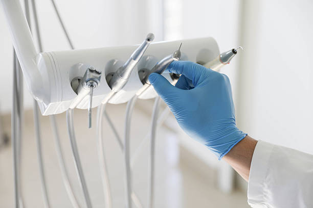 Professional Tooth Extraction technician working in Hope Mills, NC